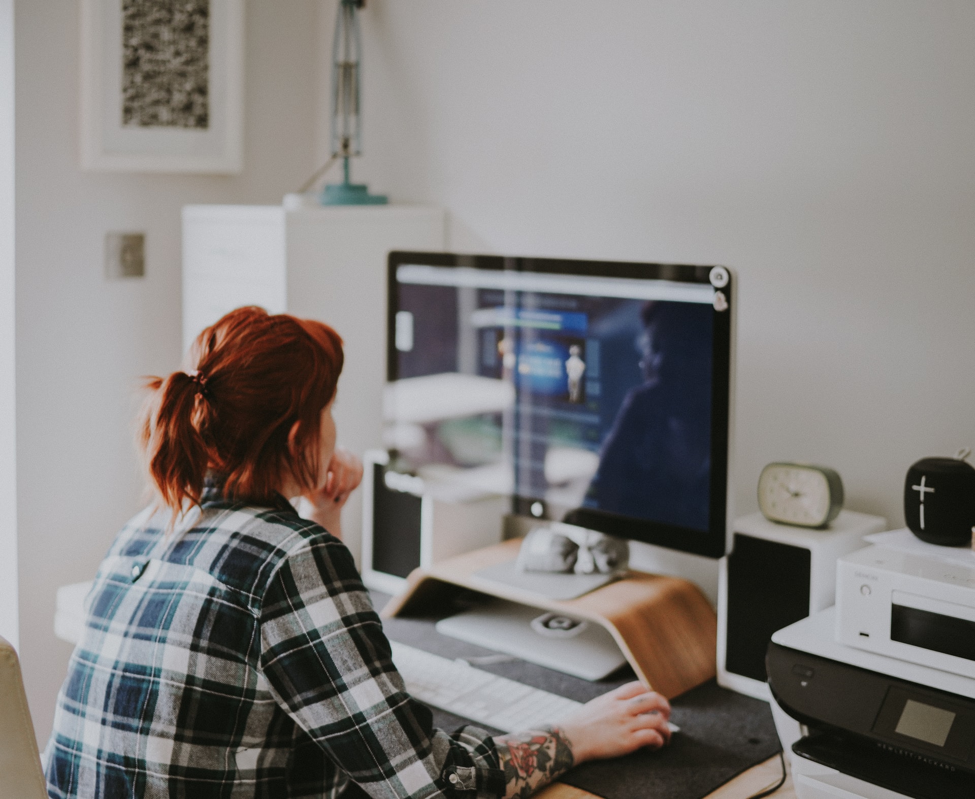 Woman on desktop computer